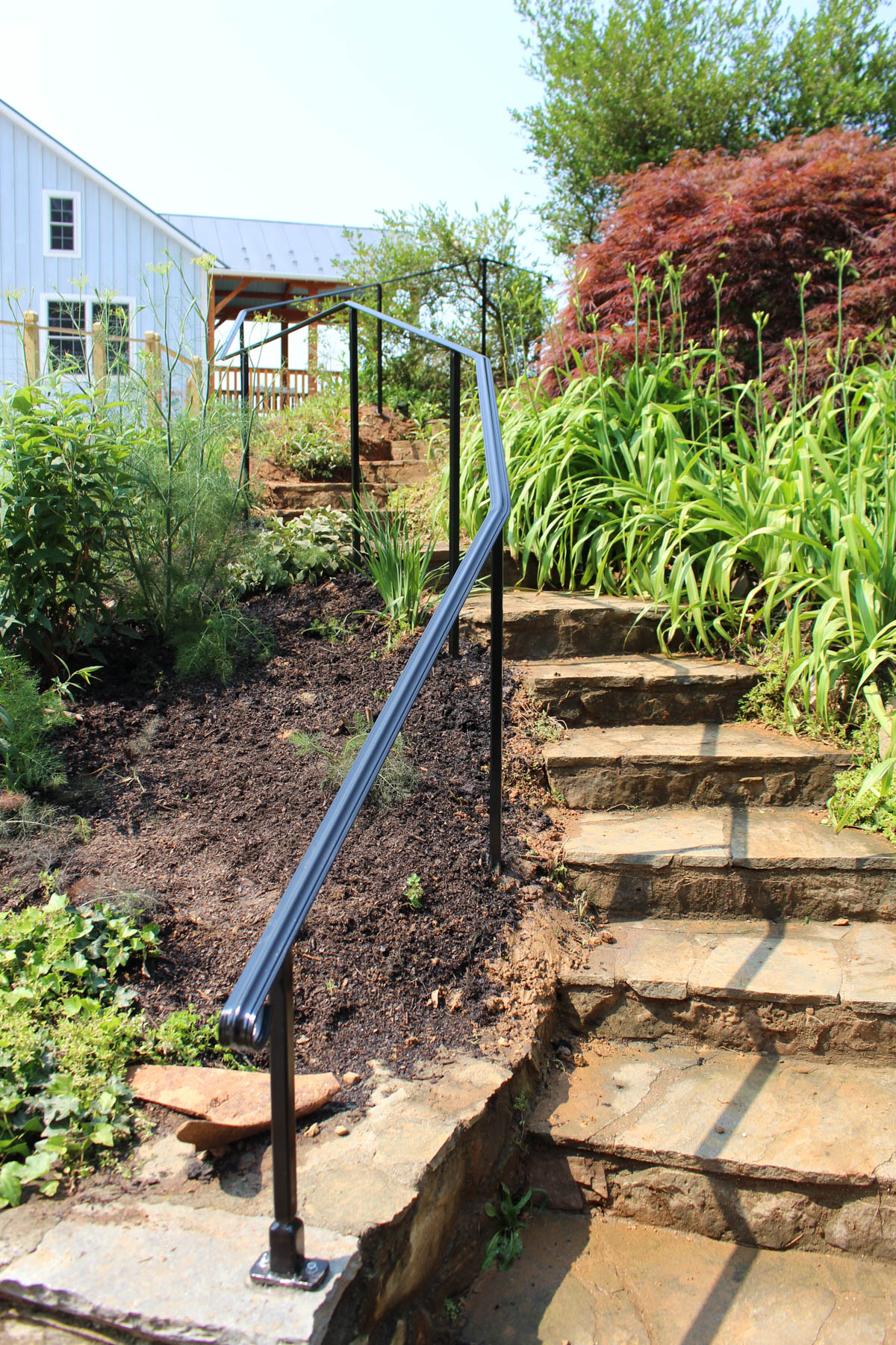 This showcases a completed loudoun stairs project within a home in northern virginia. This showcases the rails that they handmade. 