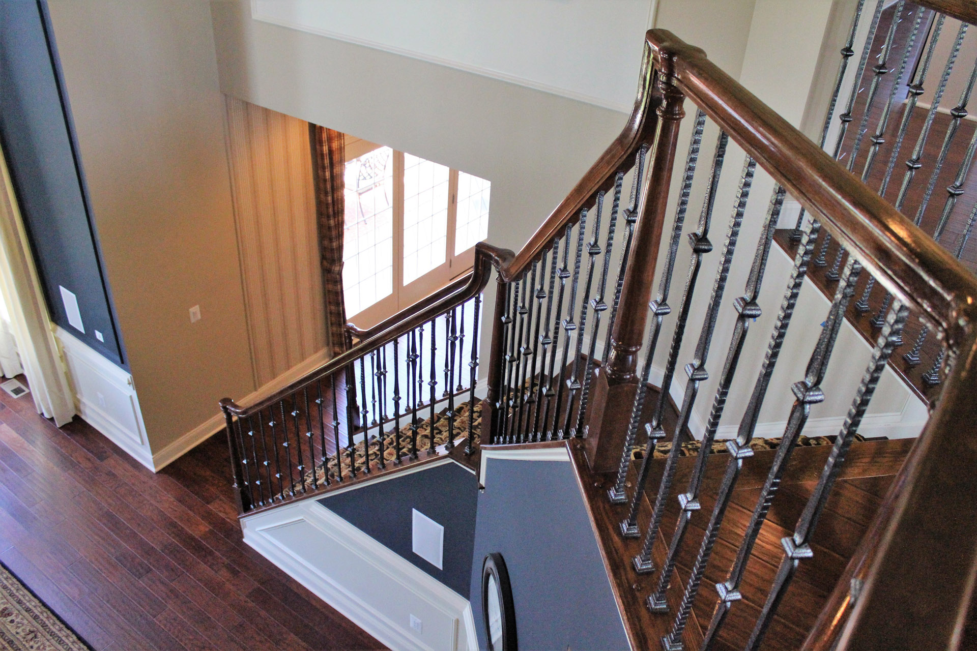 This showcases a completed loudoun stairs project within a home in northern virginia. This showcases the rails that they handmade. 
