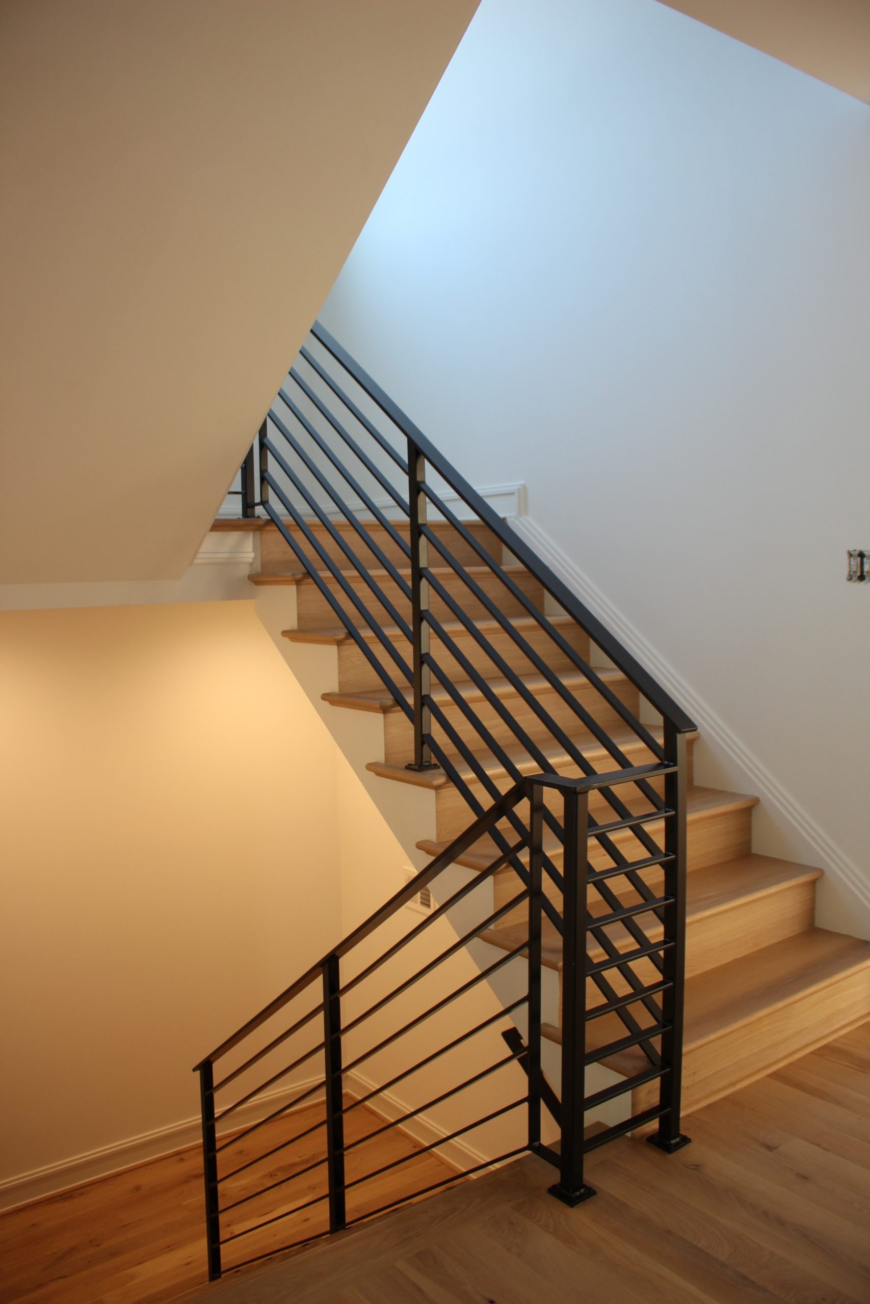This showcases a completed loudoun stairs project within a home in northern virginia. This showcases the metal fabrication that loudoun stairs did in their shop. 