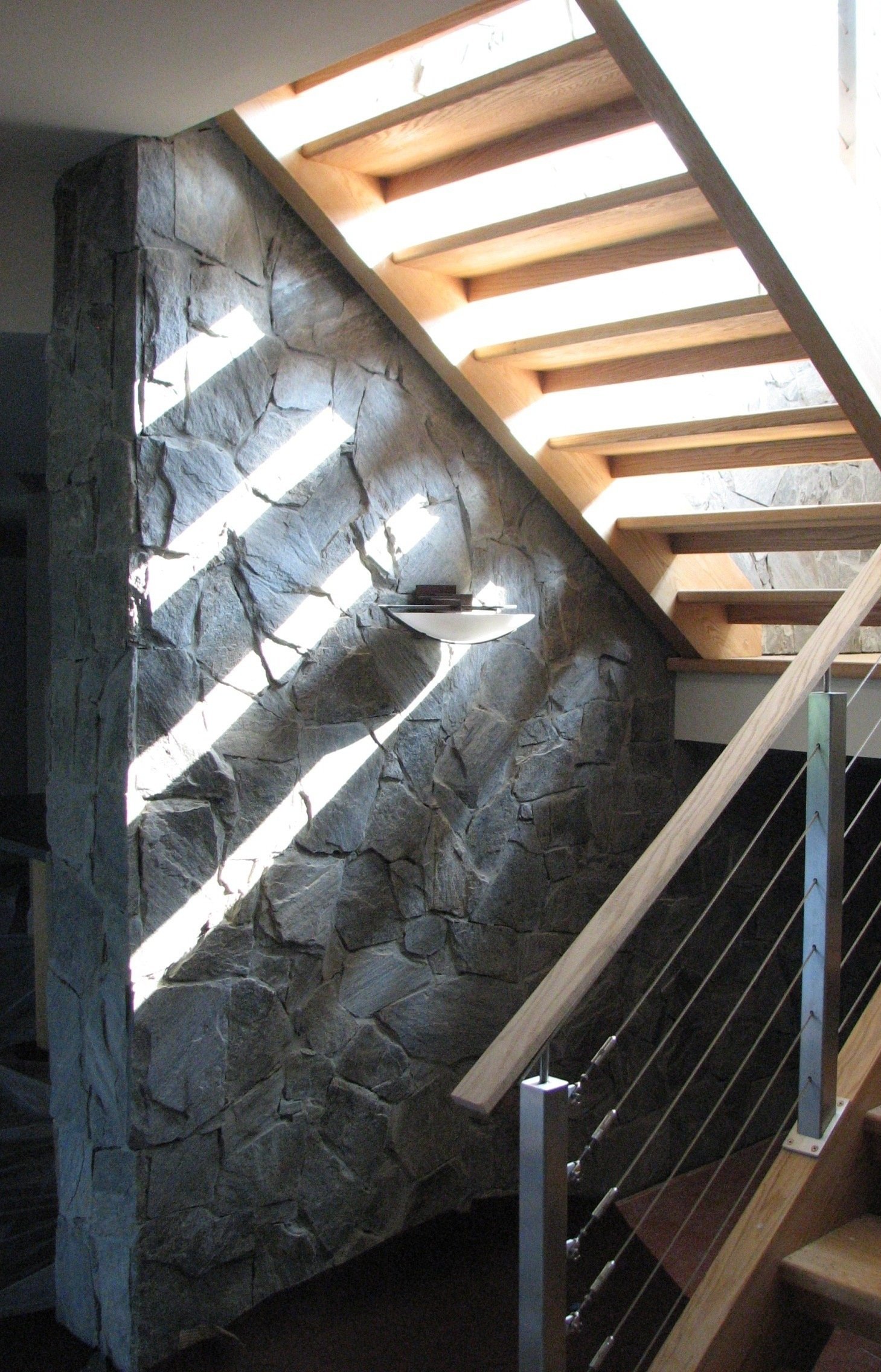 This showcases a completed loudoun stairs project within a home in northern virginia. This showcases the rails that they handmade. 