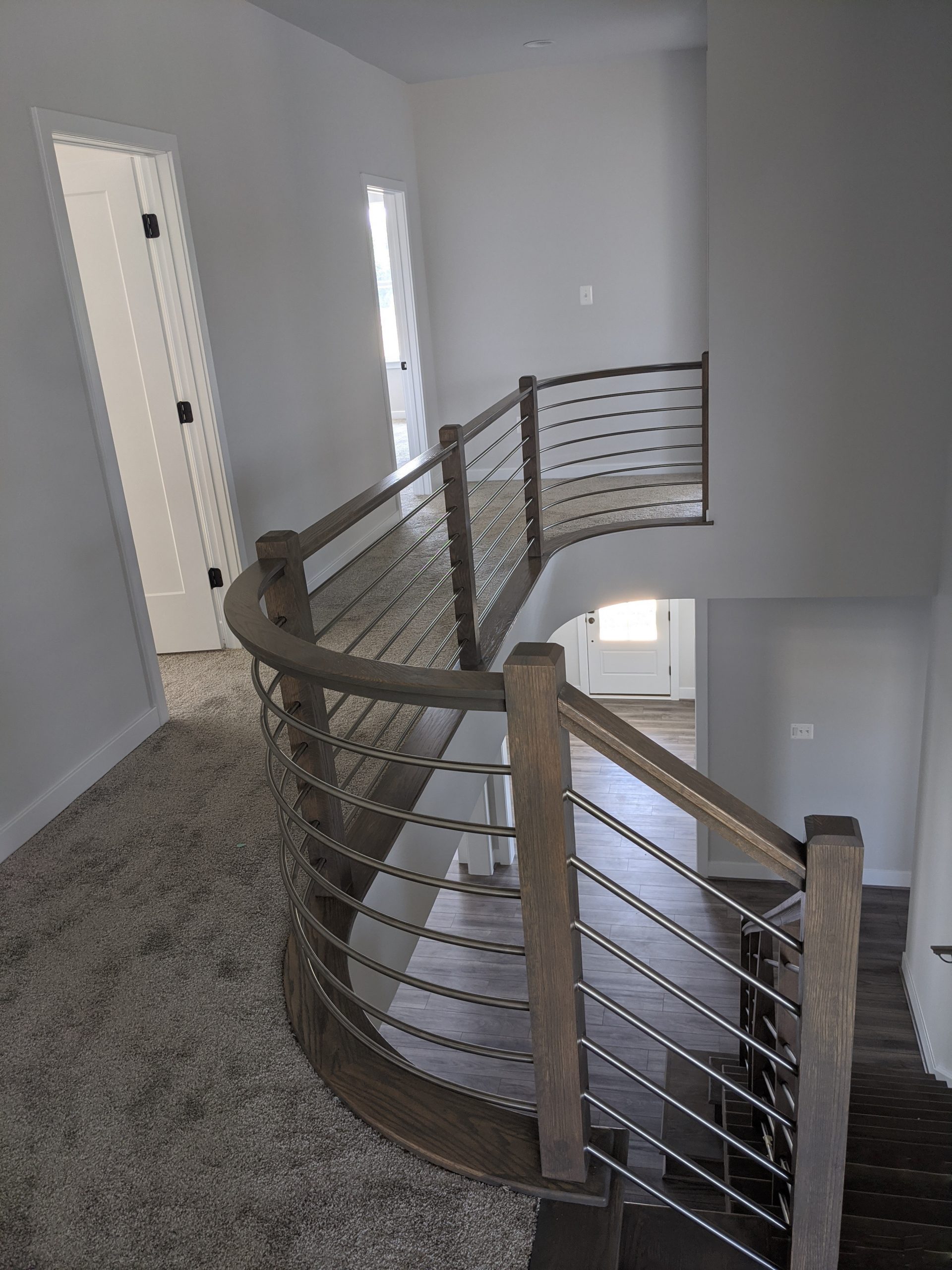 This showcases a completed loudoun stairs project within a home in northern virginia. This showcases the metal fabrication that loudoun stairs did in their shop. 