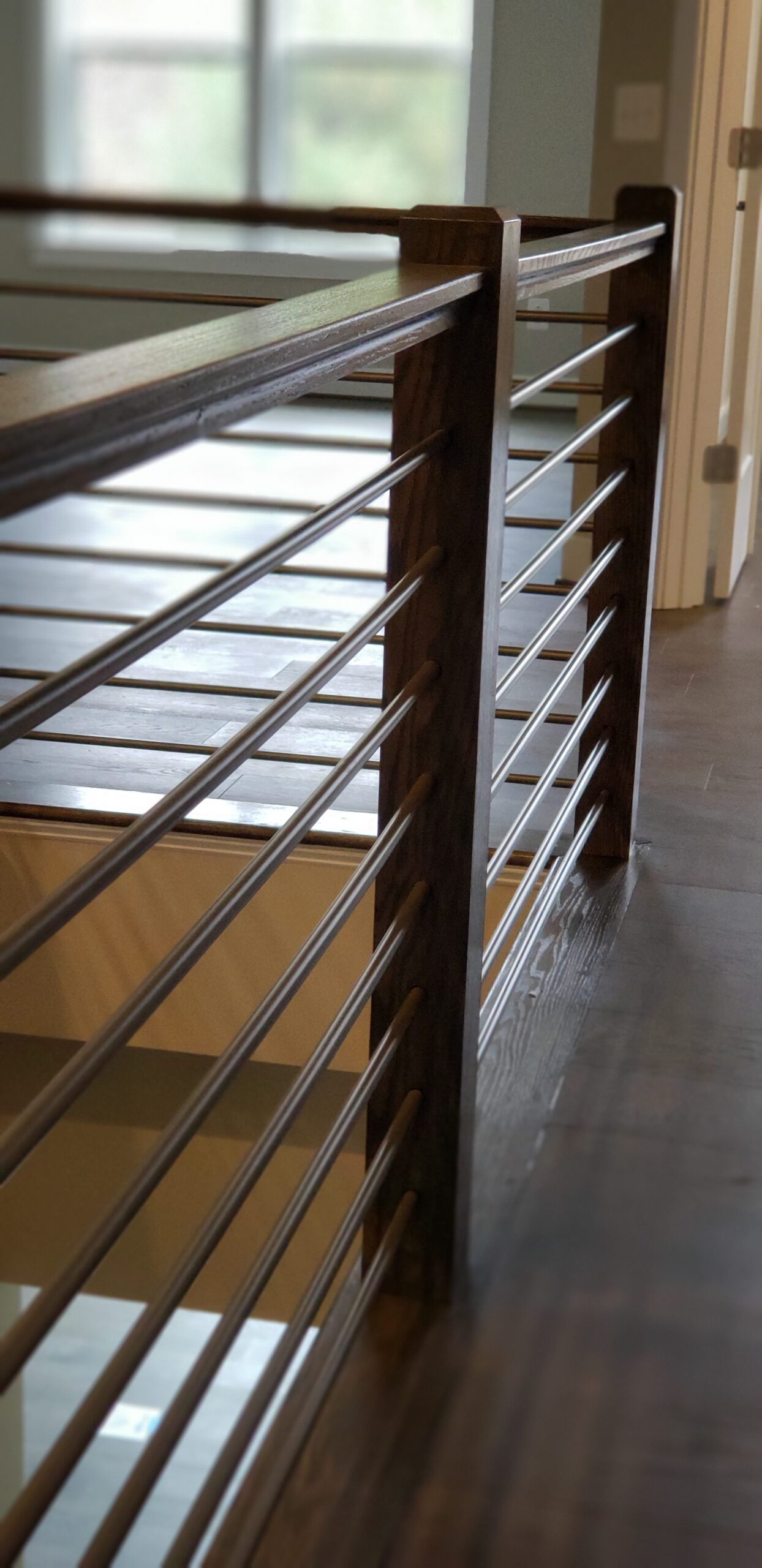 This showcases a completed loudoun stairs project within a home in northern virginia. This showcases the rails that they handmade. 