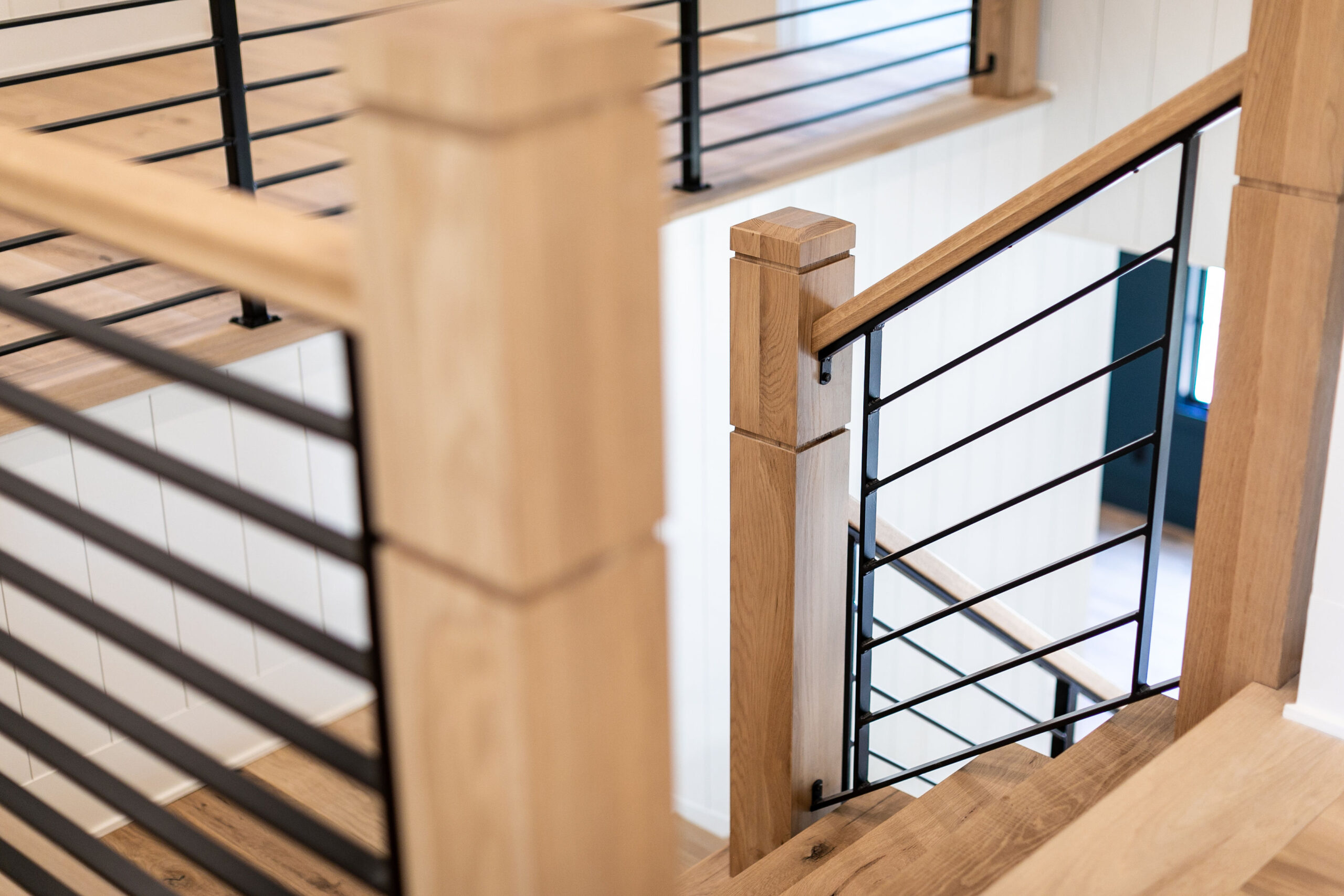 This showcases a completed loudoun stairs project within a home in northern virginia. This showcases the rails that they handmade. 
